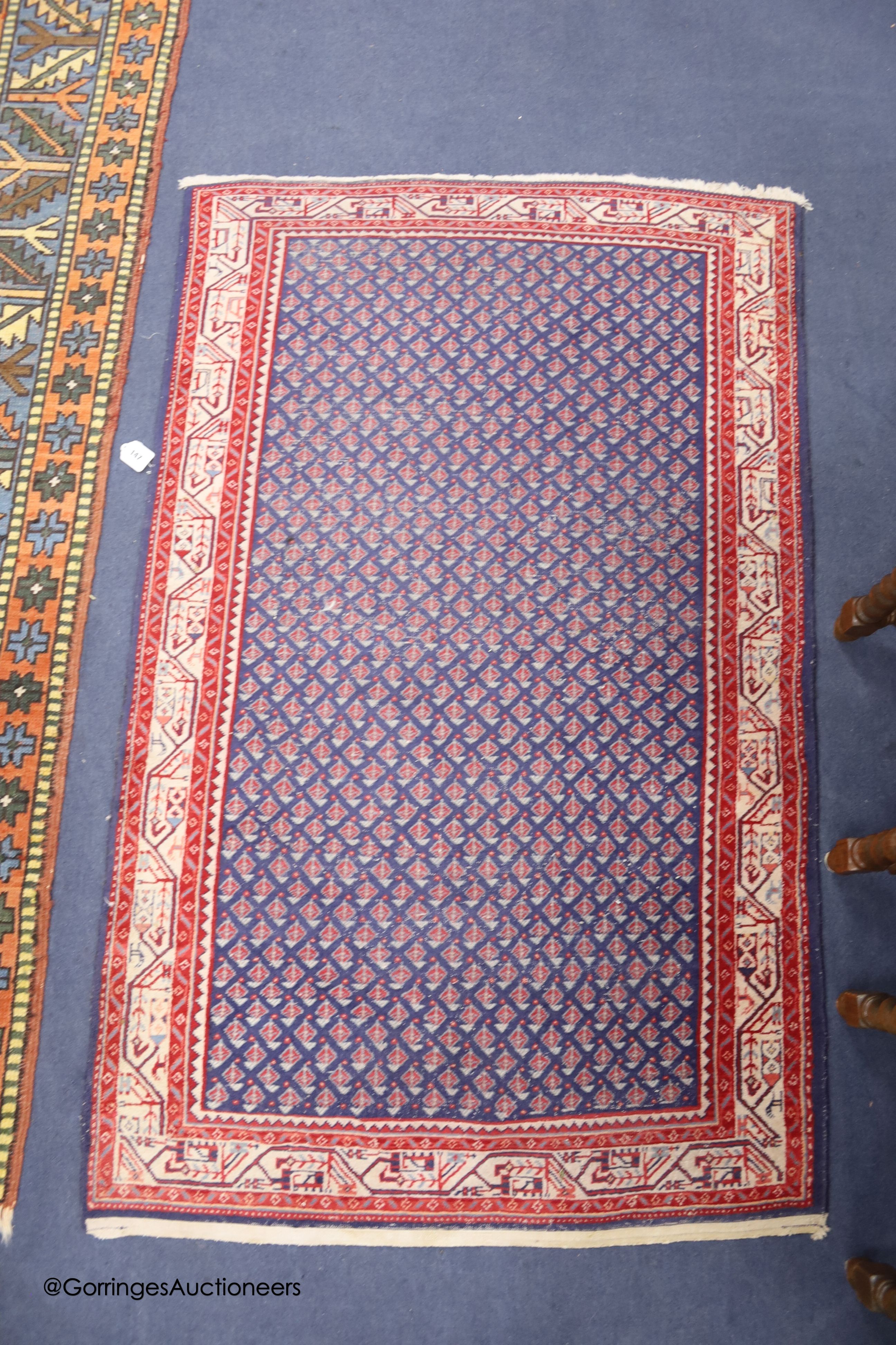 A North West Persian blue ground rug, 160 x 100cm